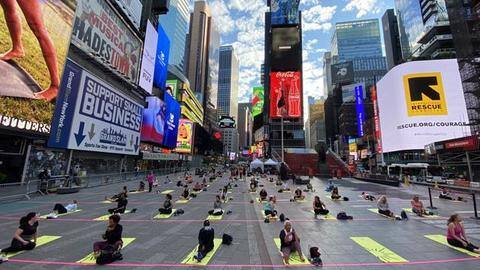 Over 3,000 people perform Yoga at Times Square Over 3,000 people perform Yoga at Times Square