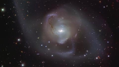 Galaxy, with supermassive black hole pairing at its heart, photographed Galaxy, with supermassive black hole pairing at its heart, photographed
