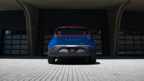 It embraces the 'weird car' trend in the EV industry