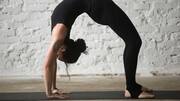 Wheel pose: A powerful yoga asana for core strength