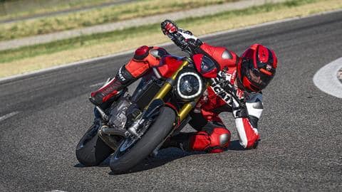 The bike has cast alloy rims and a flyscreen