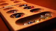 Mancala: A classic game piece for your decor 