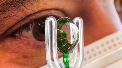 CEO wears AR-enabled contact lens to begin in-eye testing CEO wears AR-enabled contact lens to begin in-eye testing