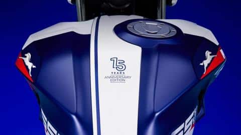 The fuel tank flaunts the serial number of the motorbike