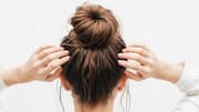 How to style a messy top knot