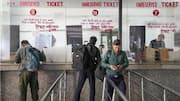 Train passengers buying tickets at counters to get insurance cover
