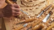 How artisans carve wood into timeless sculptures 