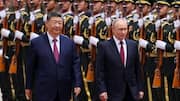 Xi, Putin meet in Beijing among pomp and pageantry 
