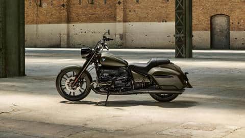 The motorcycle features a blacked-out engine with dark chrome exhaust