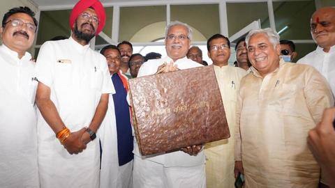 Chhattisgarh Budget: CM Baghel carries briefcase made of cow dung Chhattisgarh Budget: CM Baghel carries briefcase made of cow dung