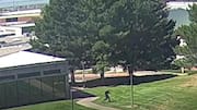 Video: Charlie Kirk shooter seen running across roof, fleeing scene 