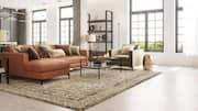 How to layer rugs for a warm and inviting home 