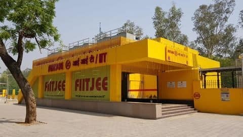 IIT-FIITJEE row: DMRC covers up FIITJEE logo at metro station IIT-FIITJEE row: DMRC covers up FIITJEE logo at metro station