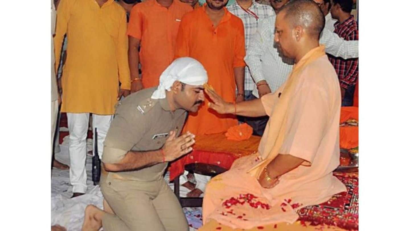Police officer kneels down before CM Yogi, photos go viral
