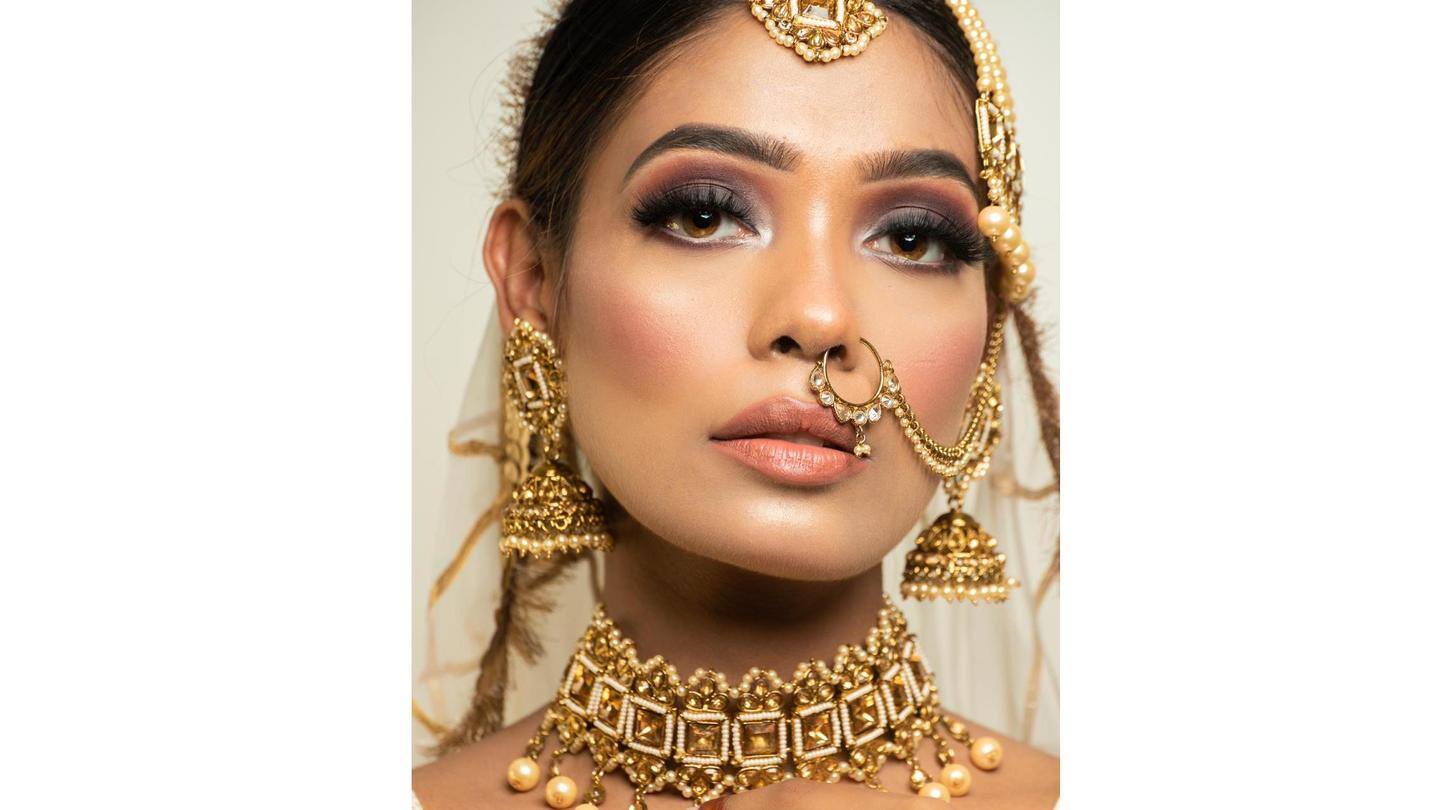 Smokey eyes with glossy nude lips is her signature style Smokey eyes with glossy nude lips is her signature style