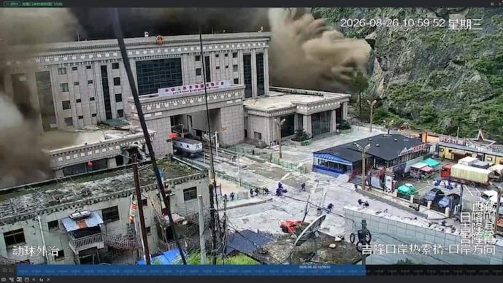 Video shows massive muddy waters crashing into buildings in Tibet
