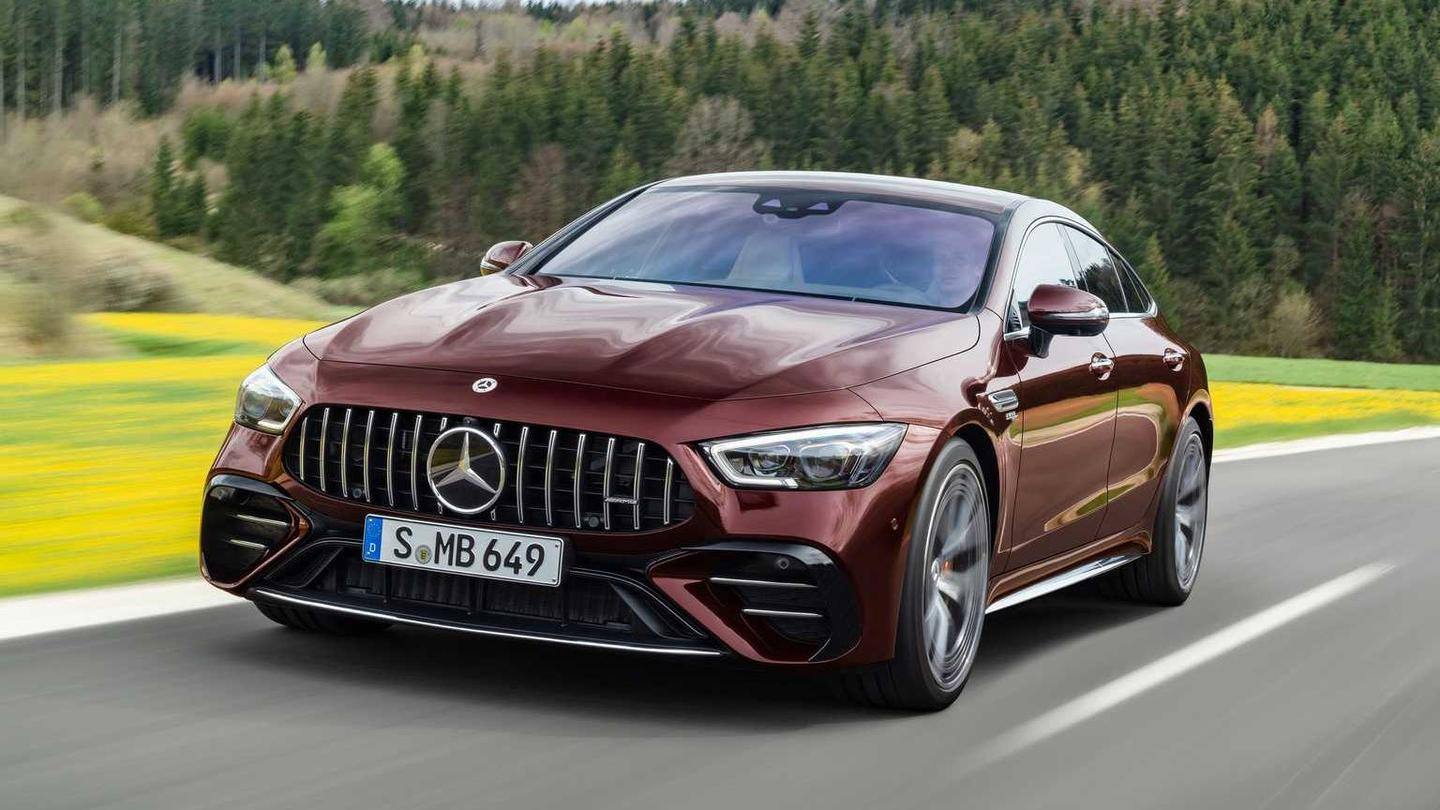 The car sports a wide grille with vertical slats The car sports a wide grille with vertical slats