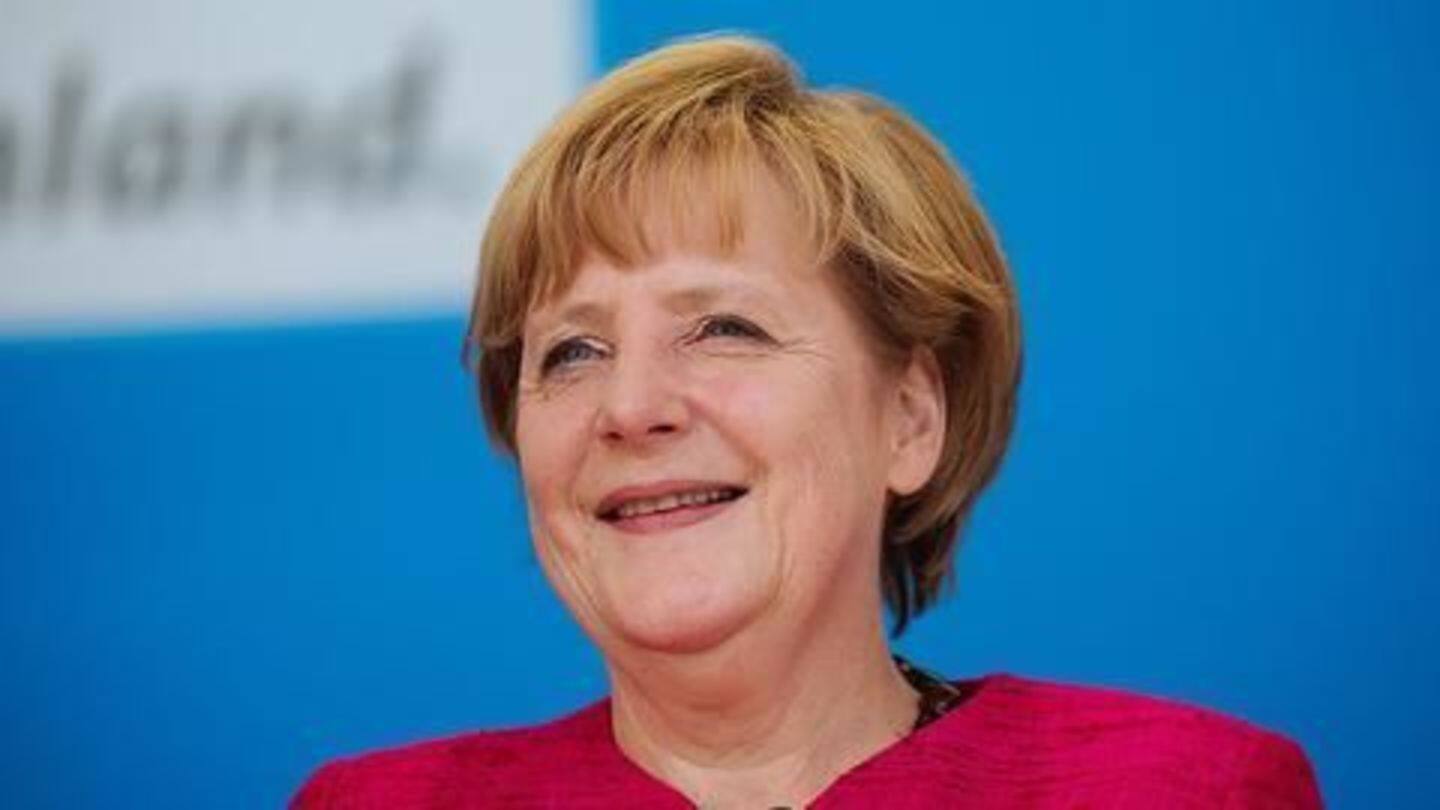Merkel wins key state election, paves way for national polls