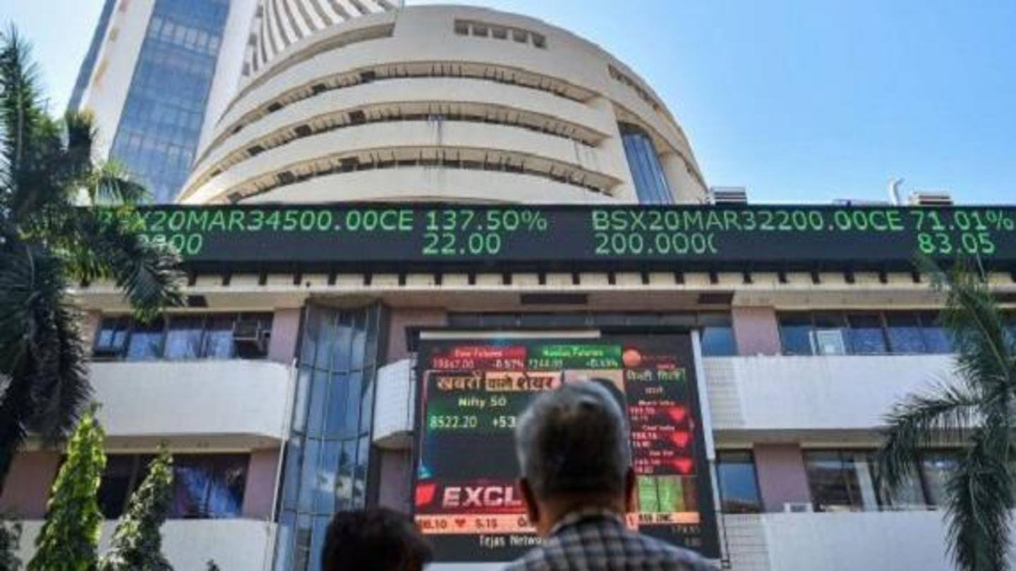 Sensex hits fresh record high; Nifty hovers around 17,400