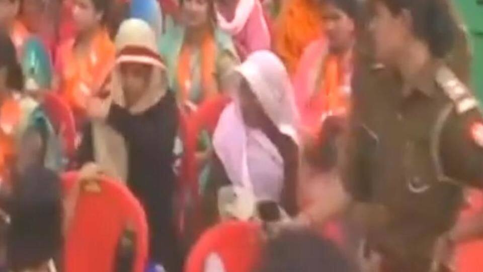 Cops seen making woman at Yogi's rally remove burqa