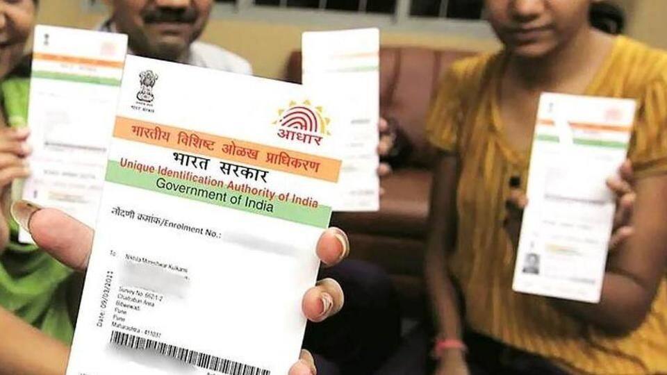 You might be able to link Aadhaar-SIM from home