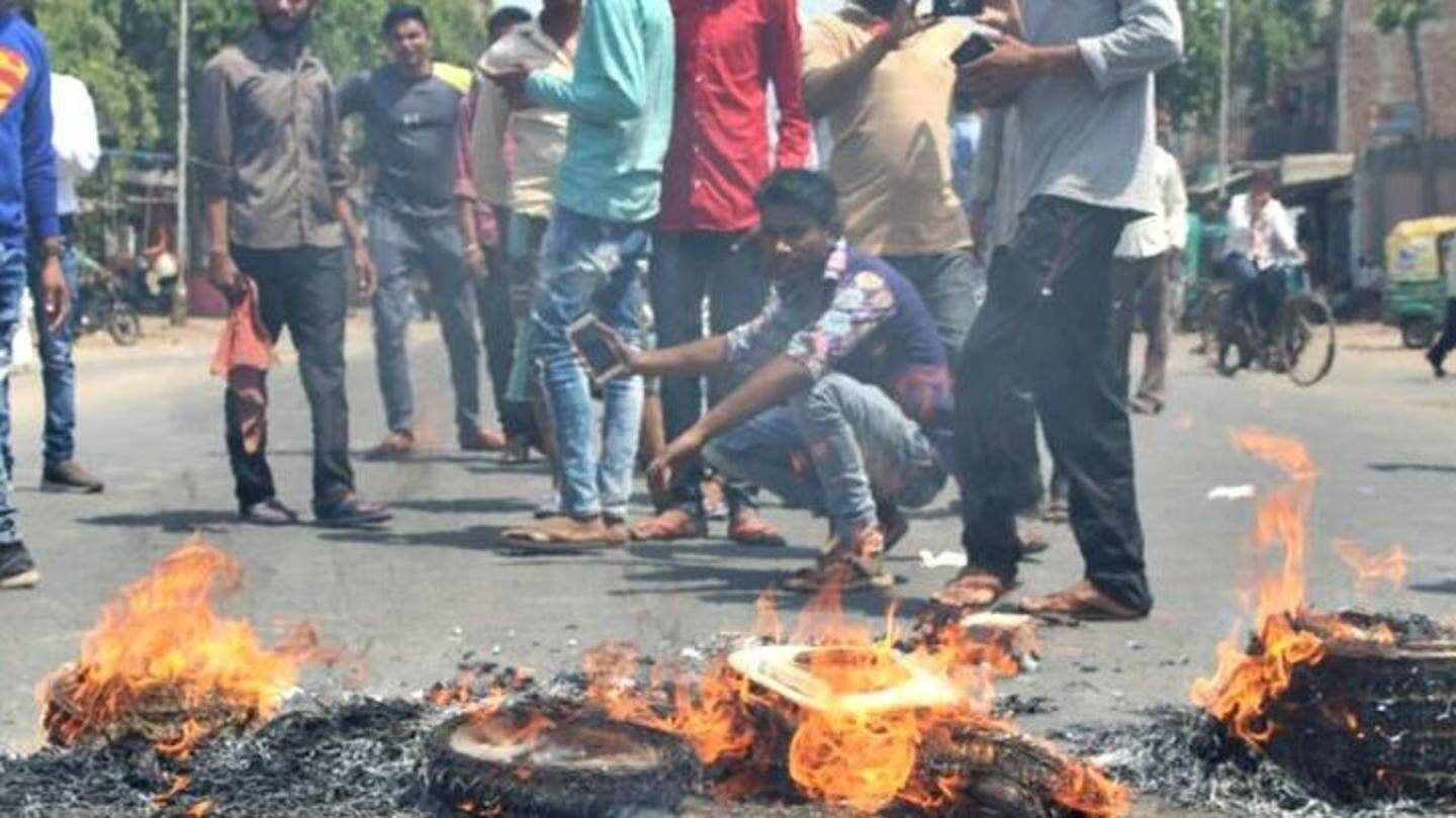In various places, protesters clash with police, vandalize property In various places, protesters clash with police, vandalize property