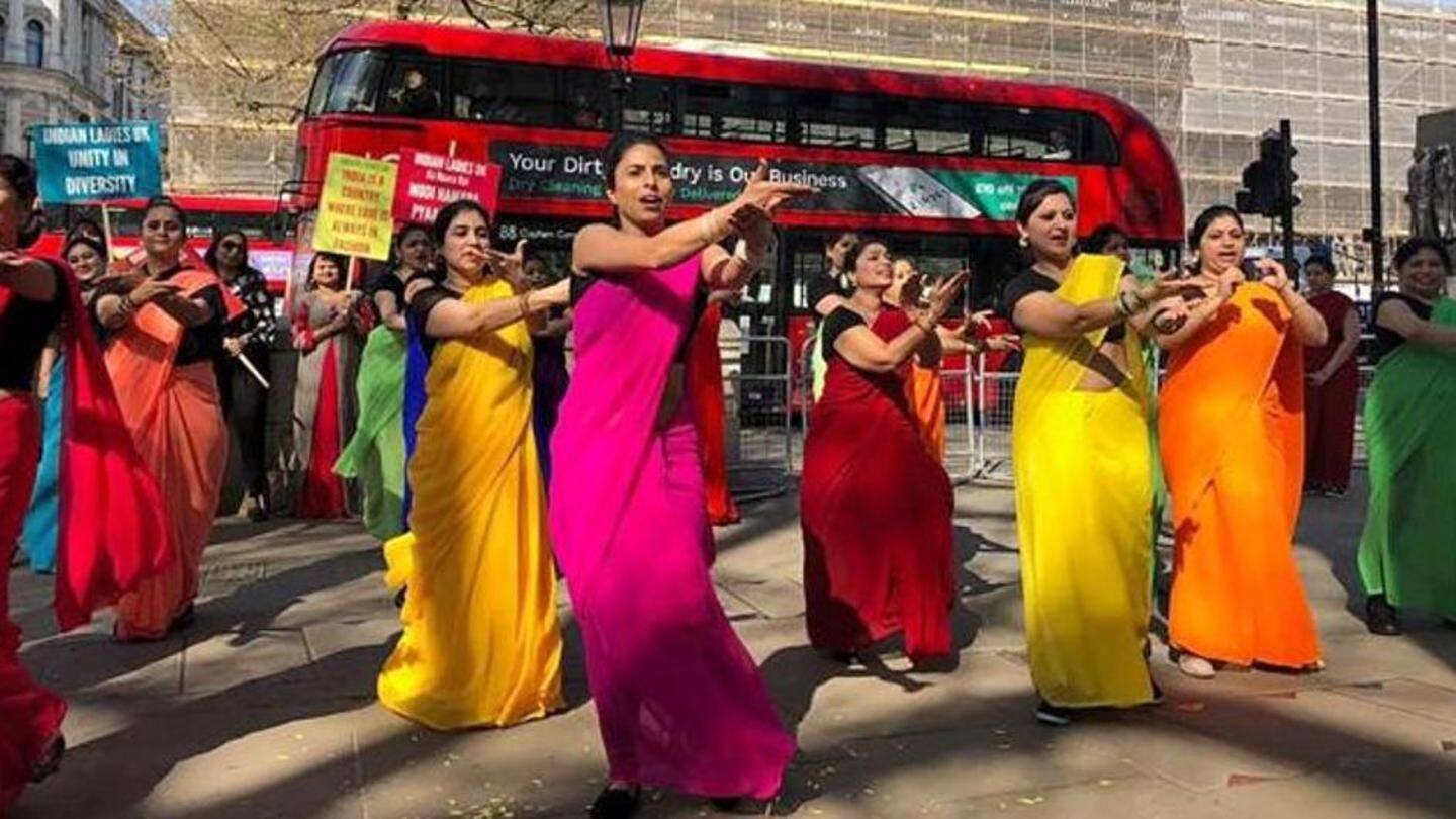 Meanwhile, saree-clad women in flash mob cheer for Modi Meanwhile, saree-clad women in flash mob cheer for Modi