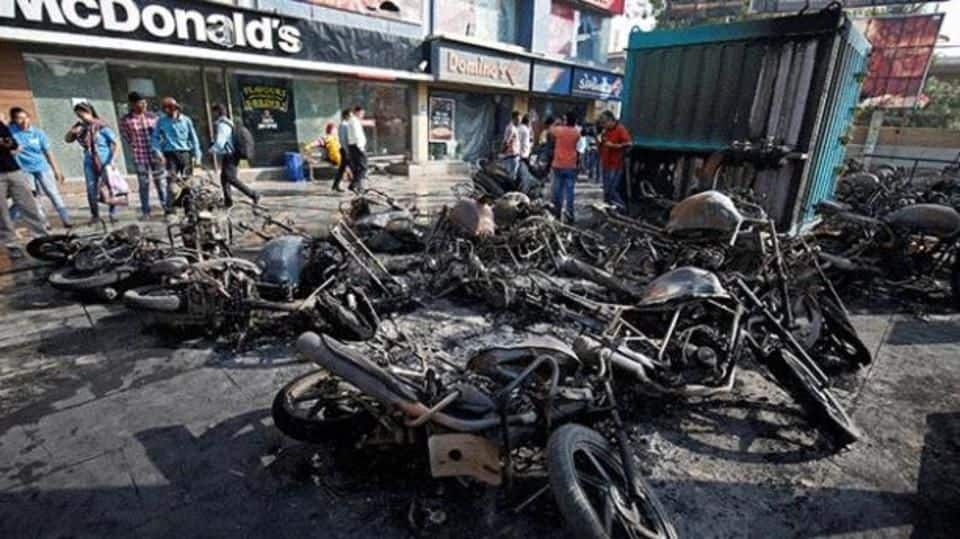 Rioters clash with police, damage property, try to immolate themselves Rioters clash with police, damage property, try to immolate themselves