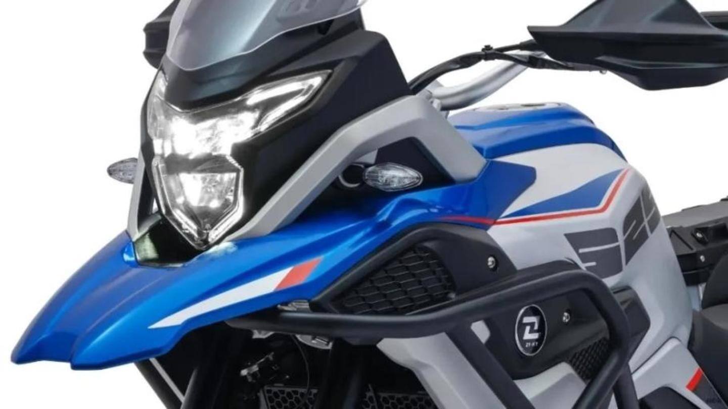 The bike has handguards and a windshield The bike has handguards and a windshield
