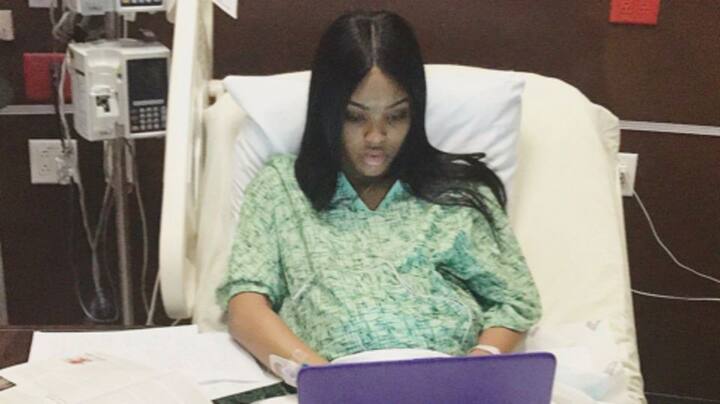 Woman in labor writes assignment from hospital; photo goes viral