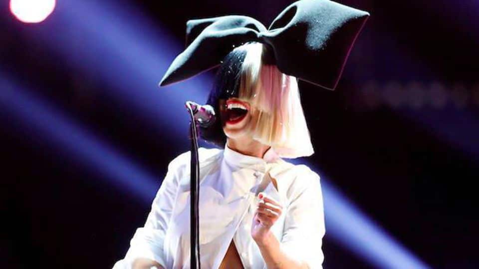 Singer Sia silences snoopy paparazzo by sharing her nudes