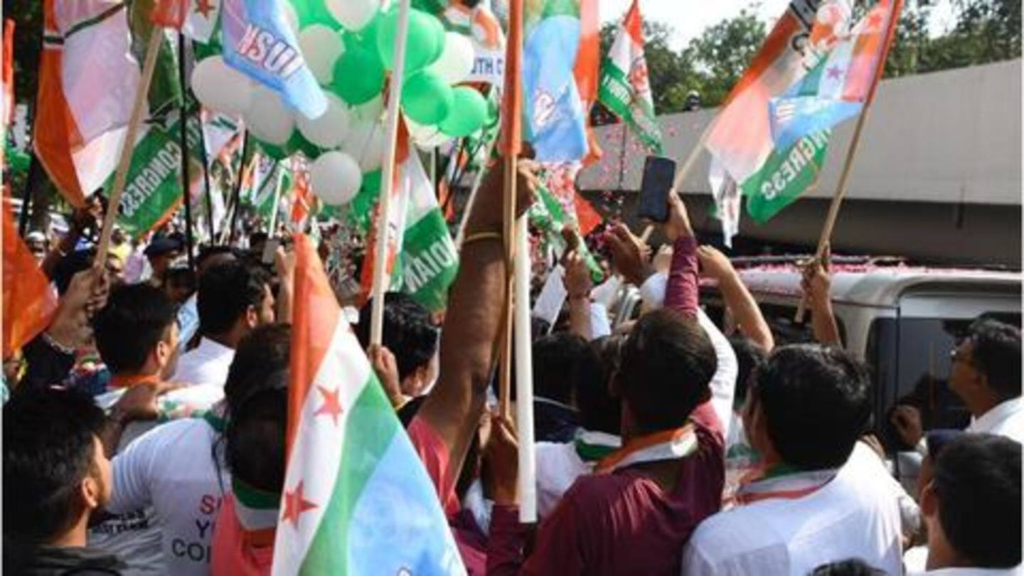 Outside court, Congress supporters waved party flags Outside court, Congress supporters waved party flags