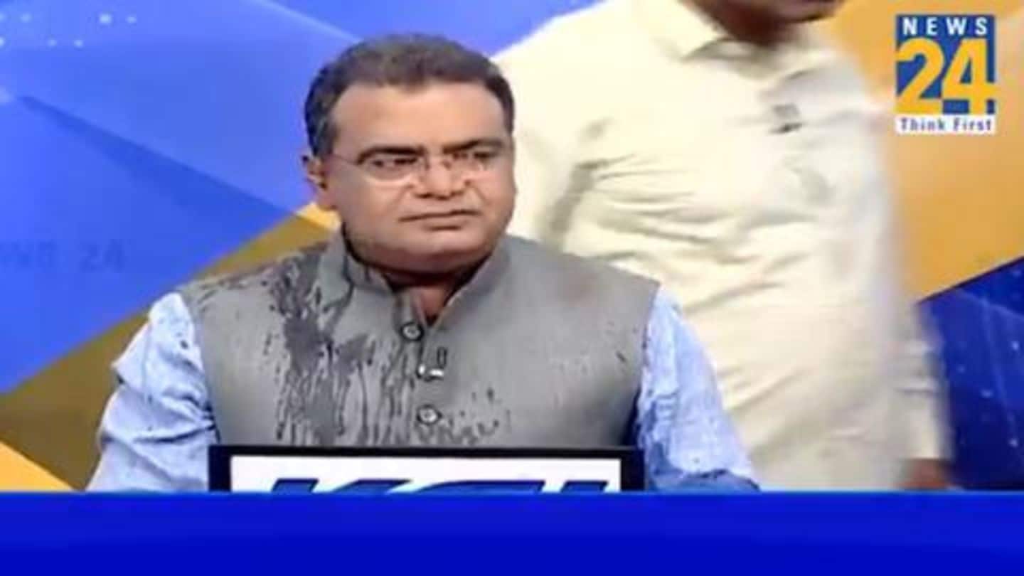 Watch: Congressman throws water on BJP's spokesperson during live debate