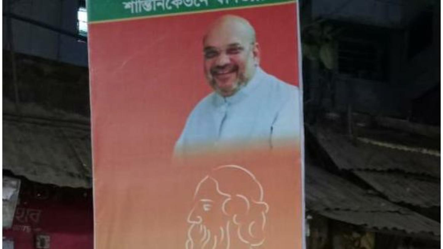 Saffron colored posters placed Shah above Tagore, prompted controversy Saffron colored posters placed Shah above Tagore, prompted controversy