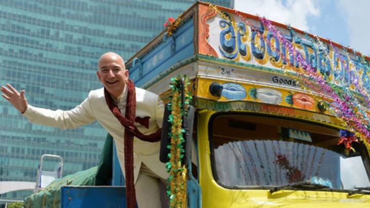 Amazon boss Jeff Bezos visits India as traders plan protest