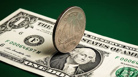 Indian rupee hits record low of 92.33 against US dollar