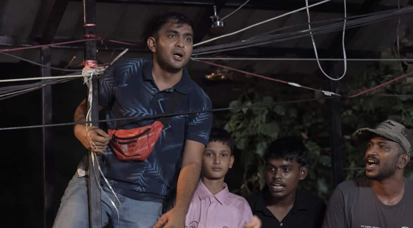 Abishai Emmanuel George helps reunite child at Jantar Mantar protest