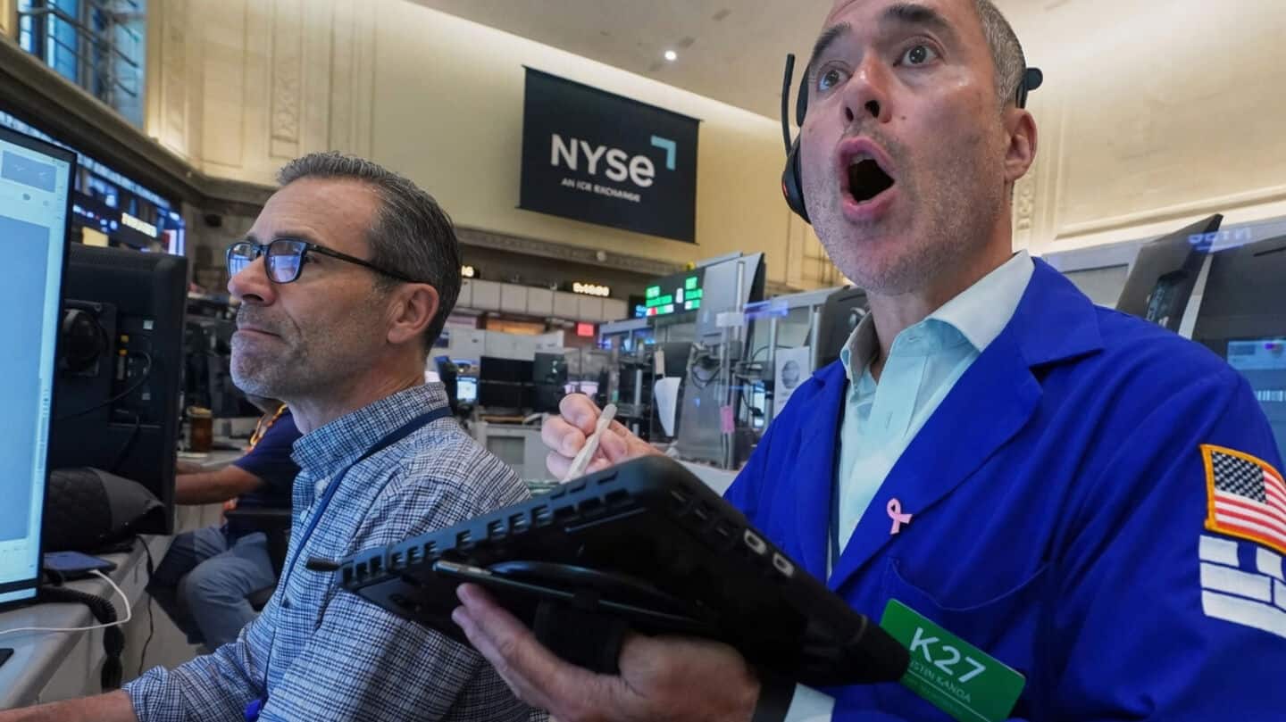 US stocks slide after Fed hints at later rate hike
