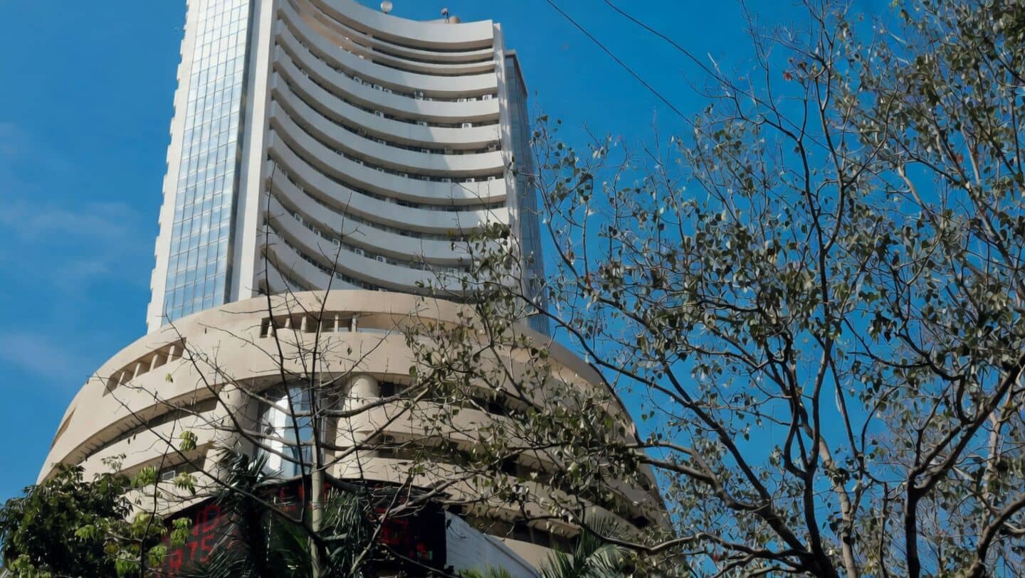 Sensex jumps 600 then closes 123 points lower at 77,989