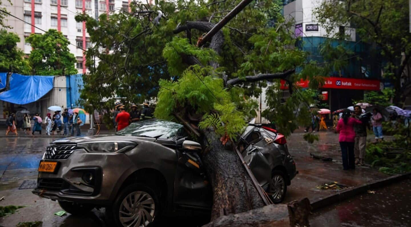 Two weeks late, Mumbai monsoon brings heavy rain, floods, protests