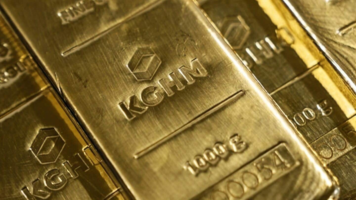 Gold edges higher as oil price drop calms inflation worries