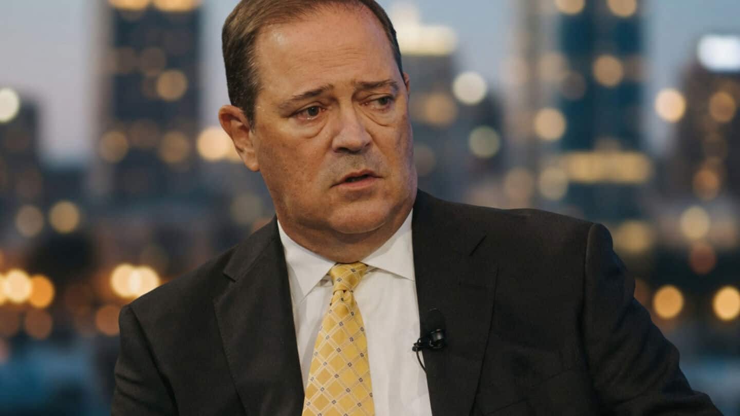 Cisco chairman and CEO Chuck Robbins says slowing AI unrealistic