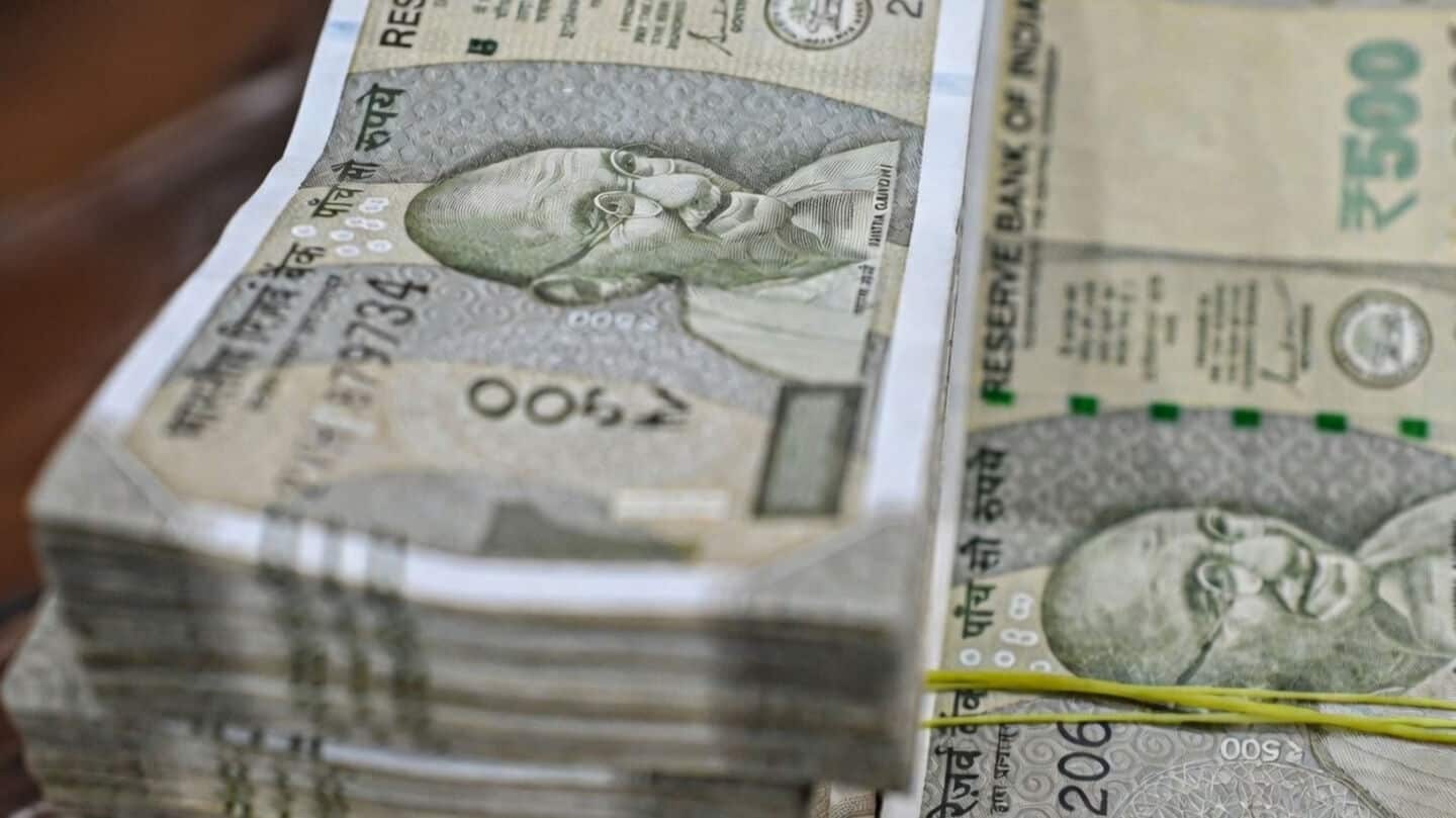 RBI curbs speculation, rupee closes at 93.06 per US dollar