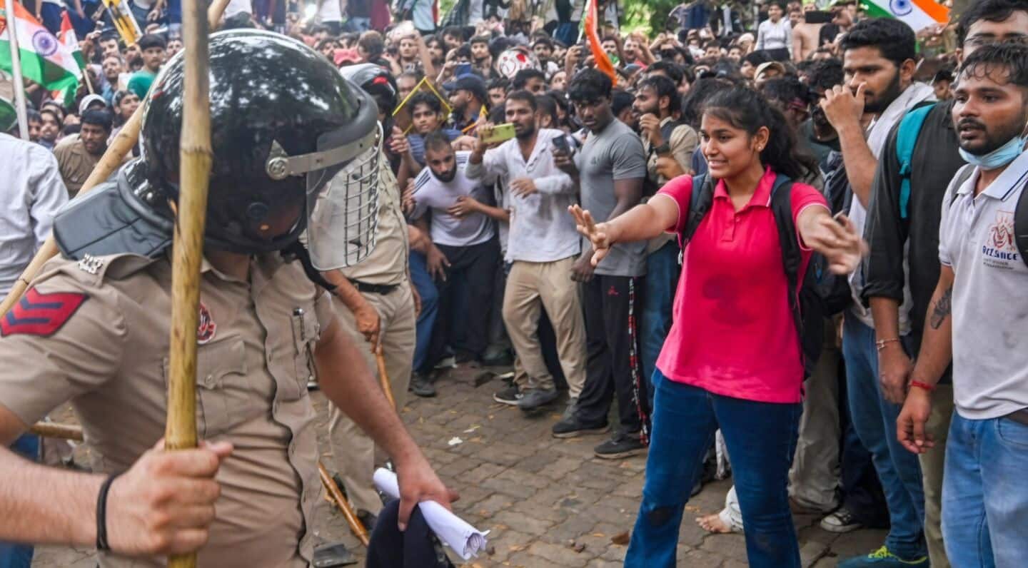 Thousands rally near Parliament demanding Dharmendra Pradhan step down