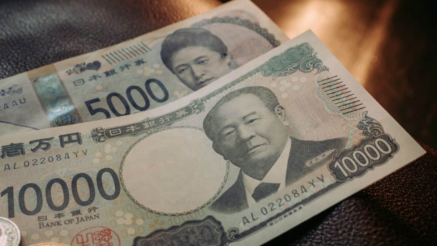 BOJ meeting summary weakens yen to 158.21 per US dollar