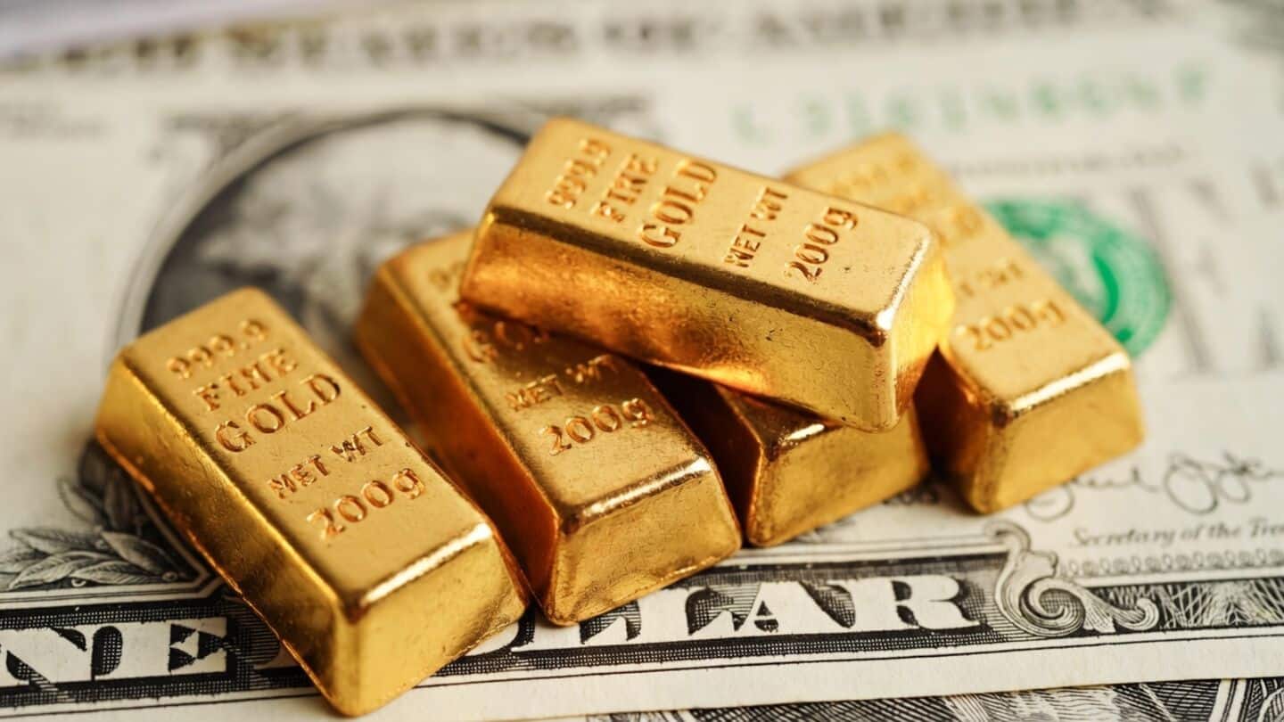 Gold hits highest in more than 2 months then slips
