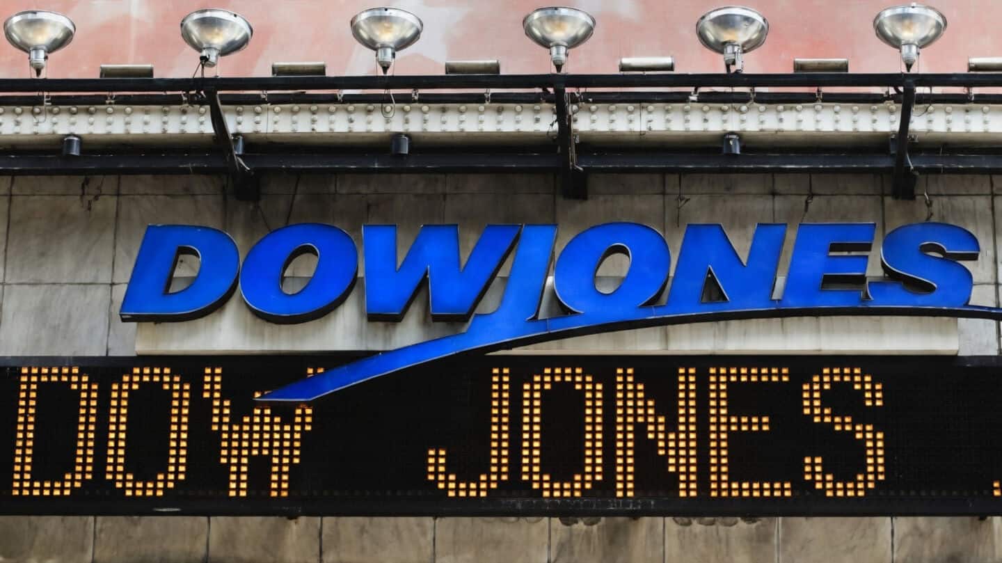 Dow tops 52,000 while Nasdaq falls on Federal Reserve uncertainty