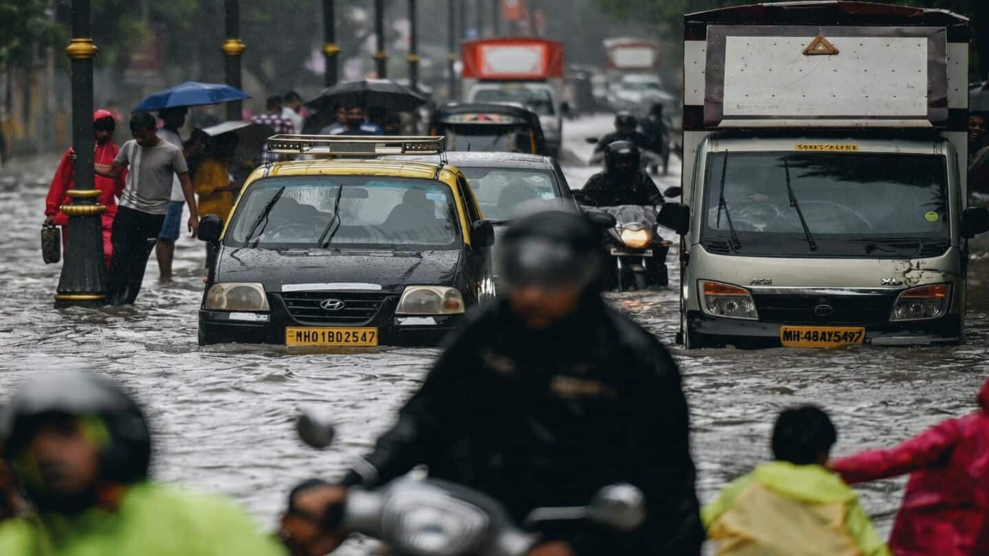 Mumbai heavy rain floods streets and diverts 11 incoming flights