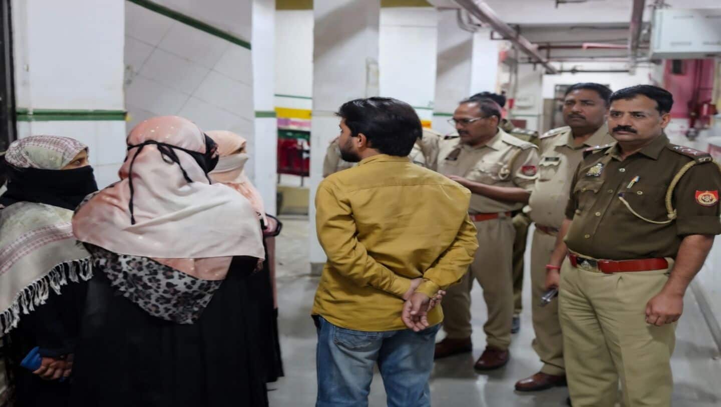 Man kills wife over divorce in front of children