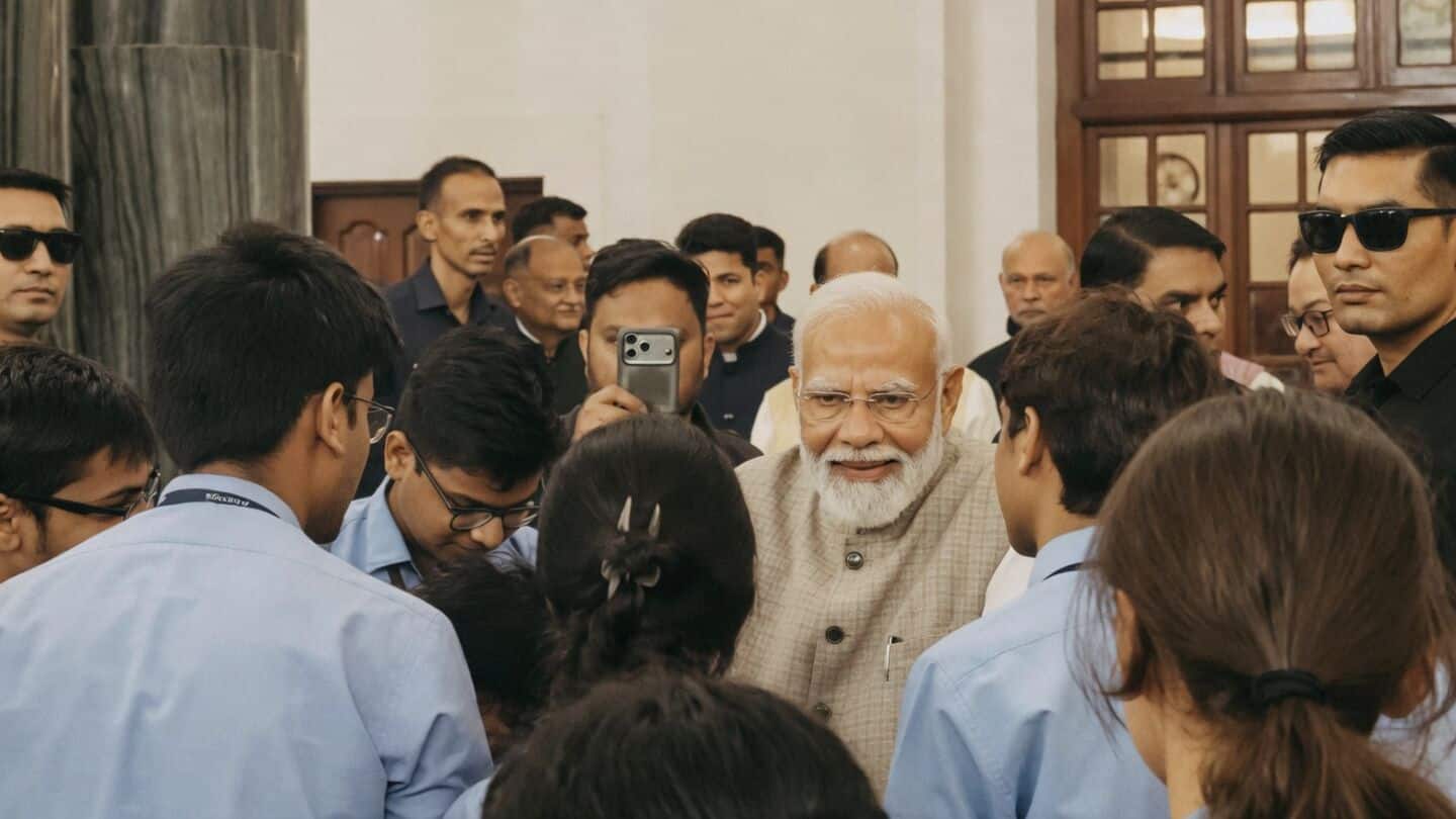 Prime Minister Narendra Modi chats with schoolchildren at Samvidhan Sadan